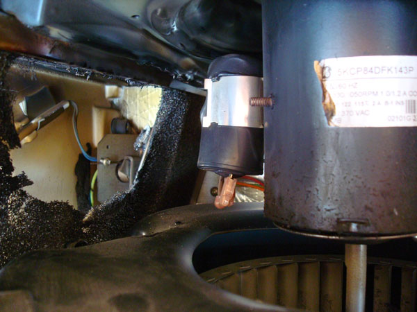 The housing above the air intake damper it closes to force recirculation of
